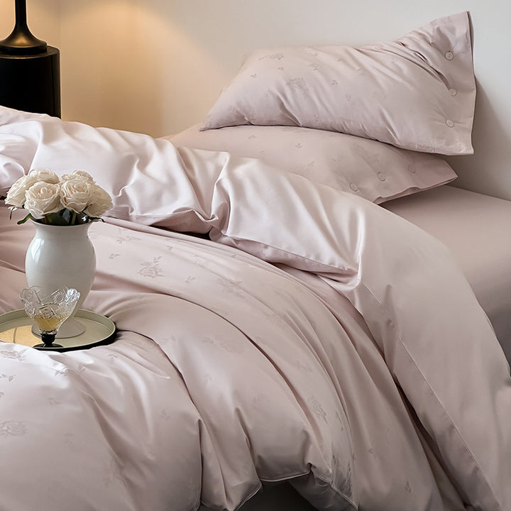 Premium duvet cover set made of cotton satin with tonal floral jacquard and button closure