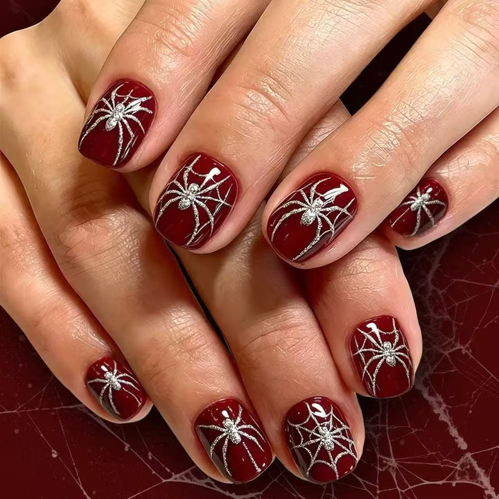 Acrylic nail set with spooky spider and glitter accents Kalsten