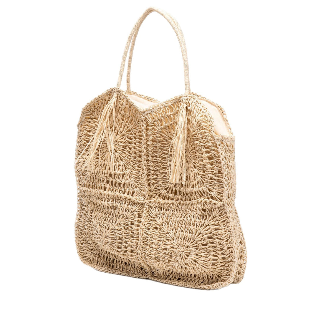 Handcrafted straw beach bag with decorative fringes Kalsten