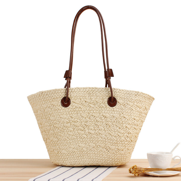 Beach bag made of high-quality braided straw with stylish leather handles Kalsten