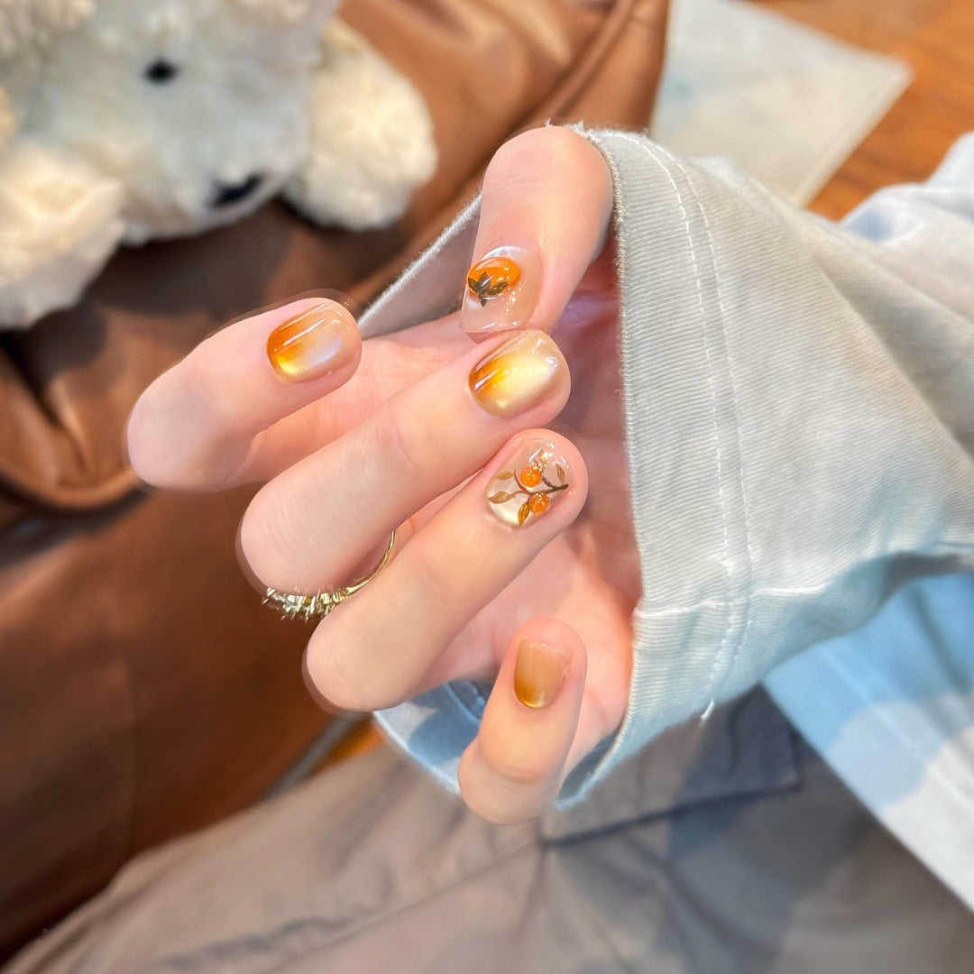 Artificial nails in elegant ombre look with floral accent Kalsten
