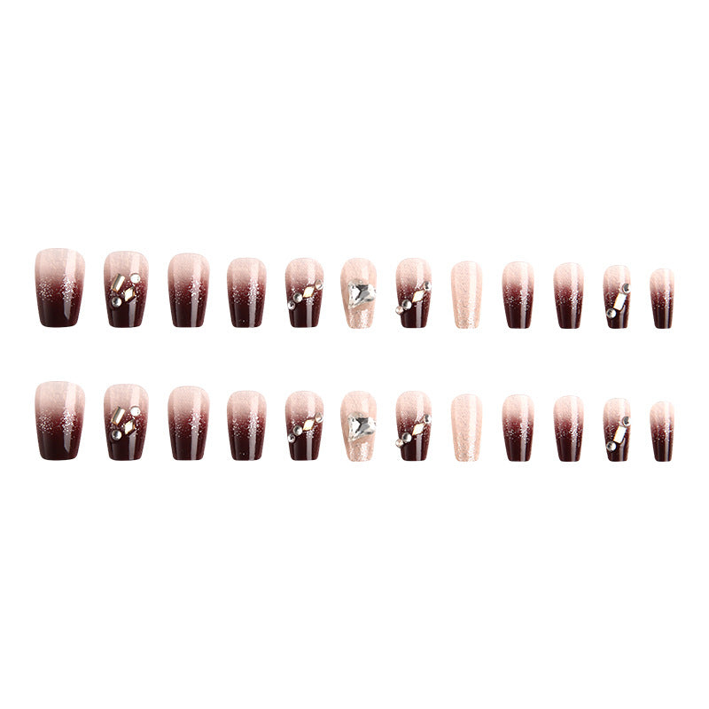 Artificials nails with glitter embellishments and elegant accents Kalsten