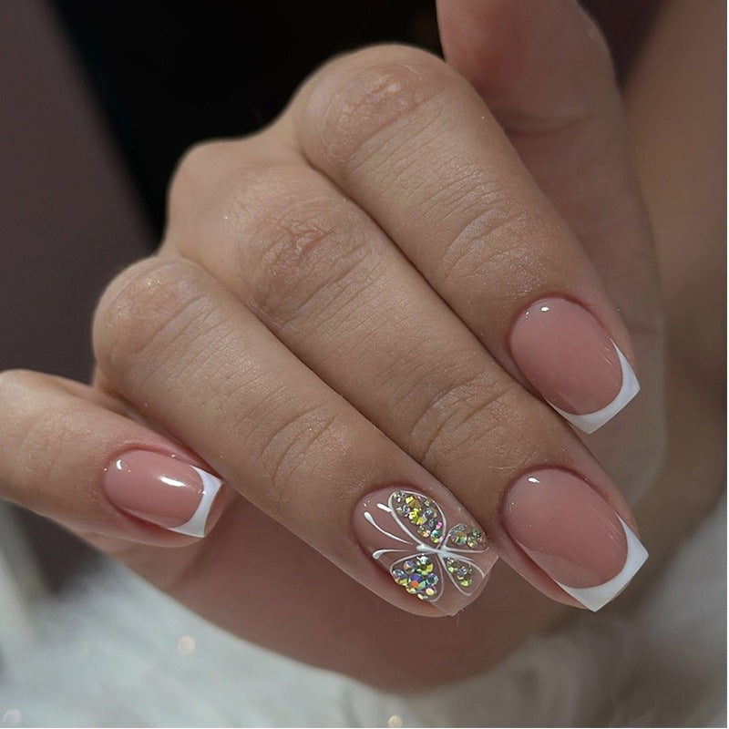 Artifical nail set with sparkling accents and elegant bows Kalsten