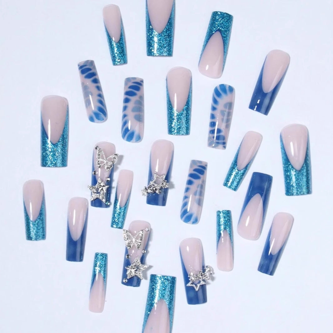 Glamorous artificial nail tips with adorned stars and glitter Kalsten