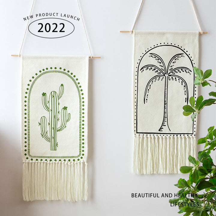 Cotton wall hanging with hand-drawn palm motif and long fringes