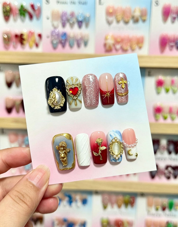 Artistic Press-On Nail Set with Floral and Green Accents