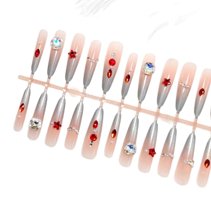 Artificial nails with glamorous glitter design and 3D applications Kalsten