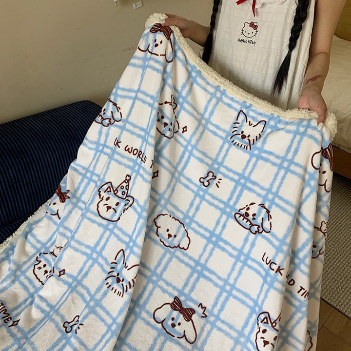 Reversible cuddle blanket with Sherpa fleece, cute dog illustrations and checkered pattern