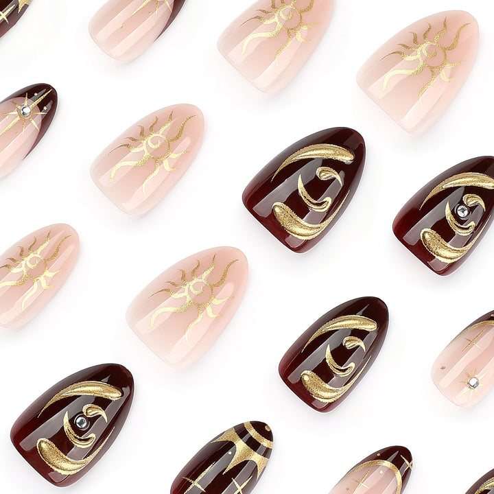Artful nail art with golden accents and mystical motifs Kalsten