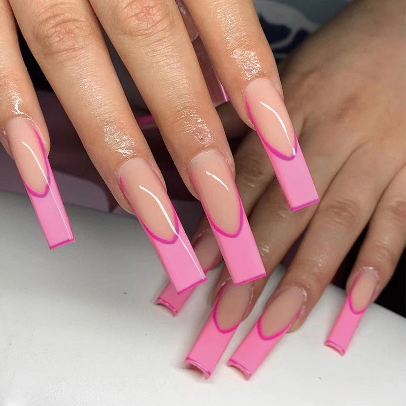 Artificial nail extensions with modern ombre design Kalsten