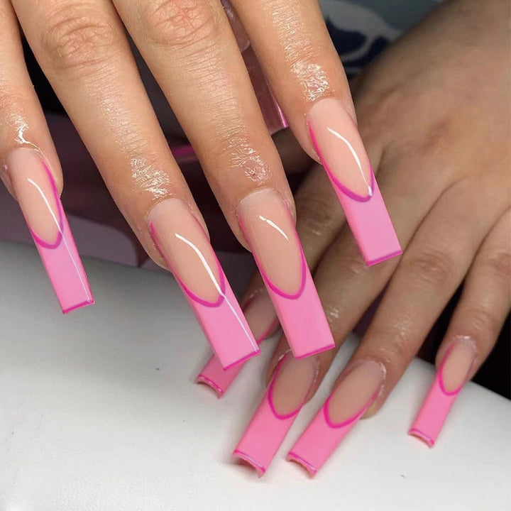 Artificial nail extensions with modern ombre design Kalsten
