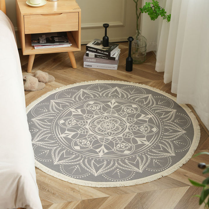 Round woven rug with mandala motif, flat cotton-jute mix and fringes Kalsten