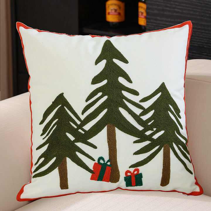 Decorative cushion cover with festive Christmas star print and pom-pom trim Kalsten