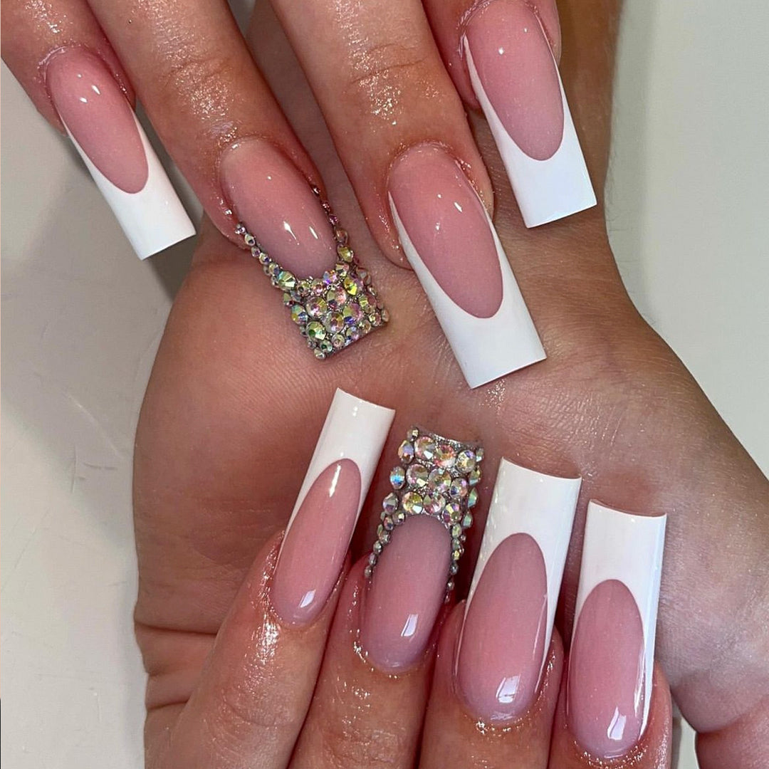 Acrylic nail set with filigree accents and glitter embellishments Kalsten