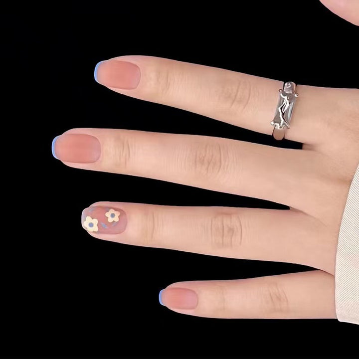Creative nail design with floral accents Kalsten