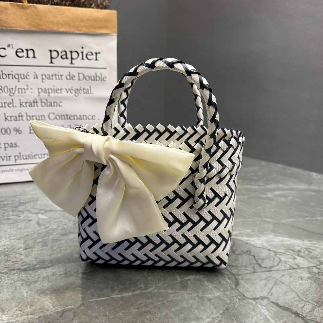 Playful basket bag with bow Kalsten