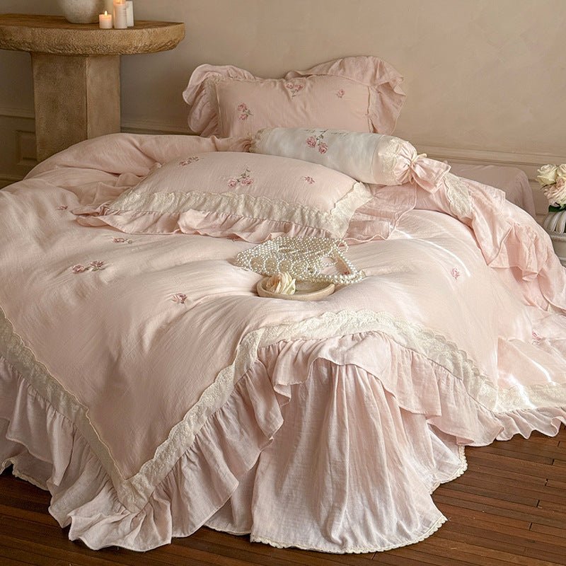 Romantic bedding set made of linen-cotton blend with ruffles and floral embroidery