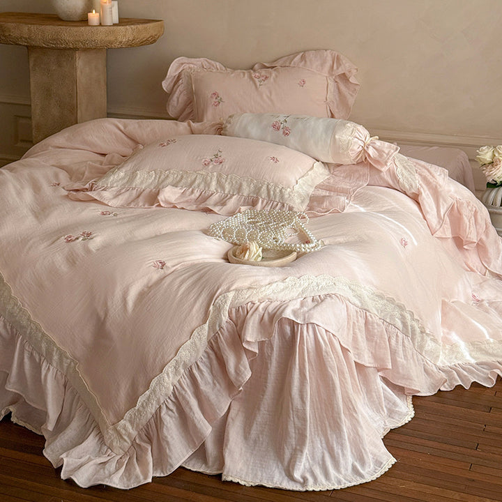Romantic bedding set made of linen-cotton blend with ruffles and floral embroidery