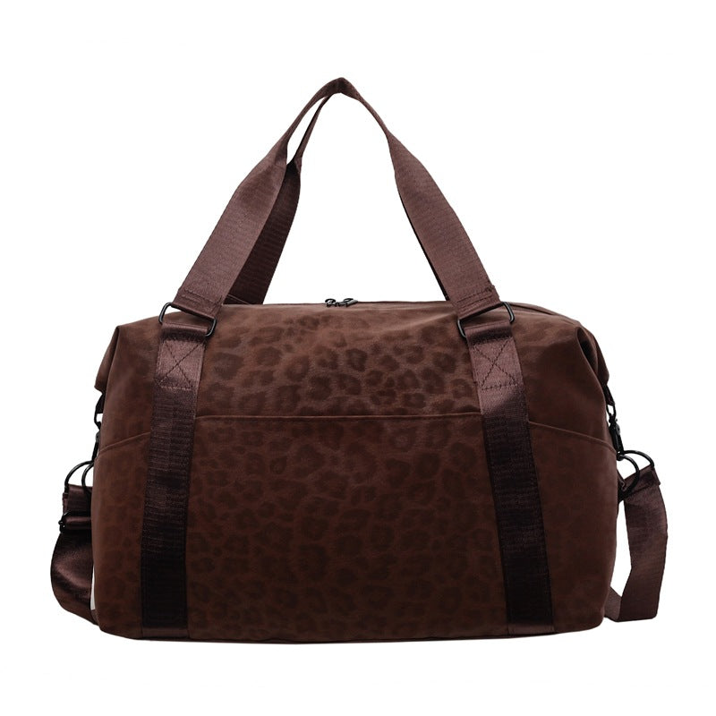 Sporty duffel bag with animal pattern and practical carrying options Kalsten