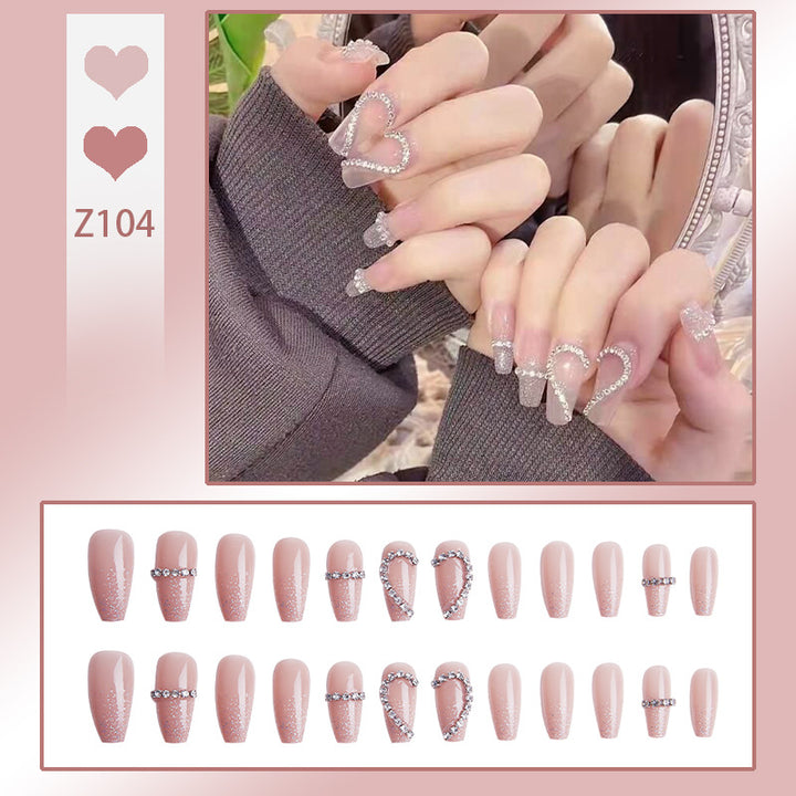 Glamorous artificial nails with heart and glitter design Kalsten