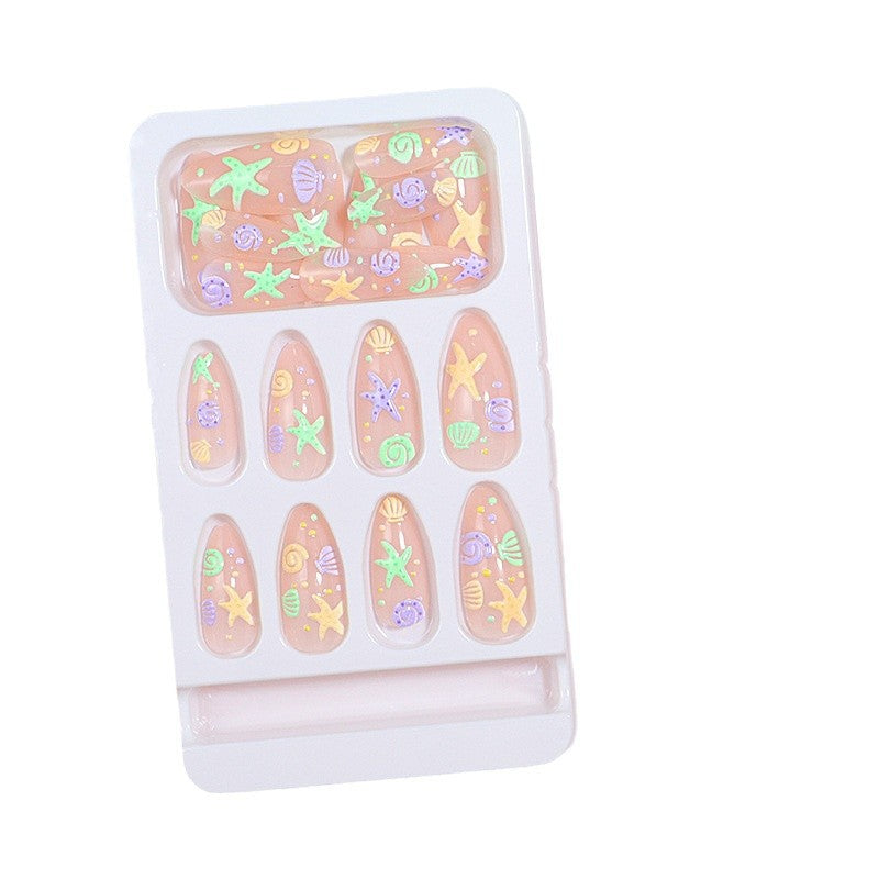 Artistic Press-On Nail Design with Ocean-Inspired Accents Kalsten