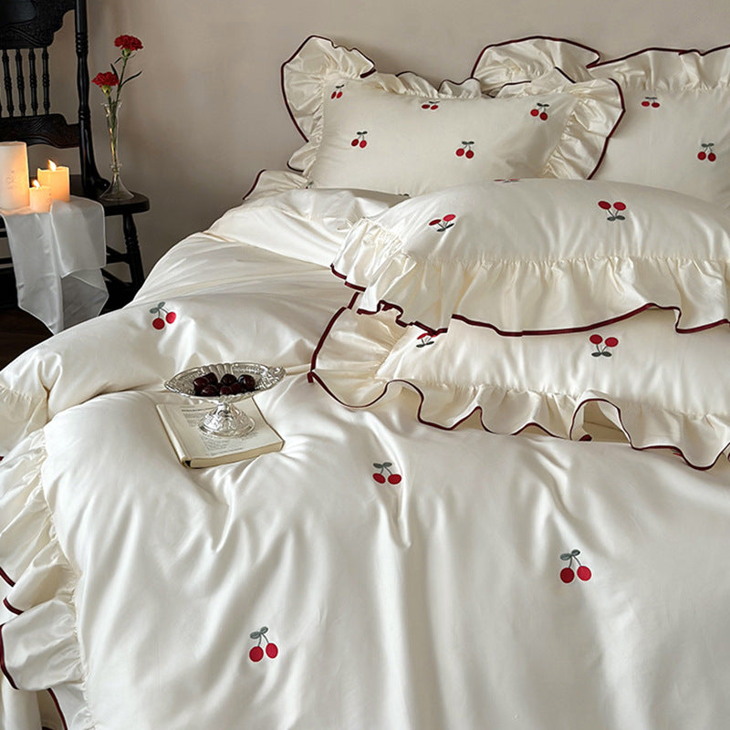 Luxury bedding set made of cotton satin with ruffles and cherry embroidery