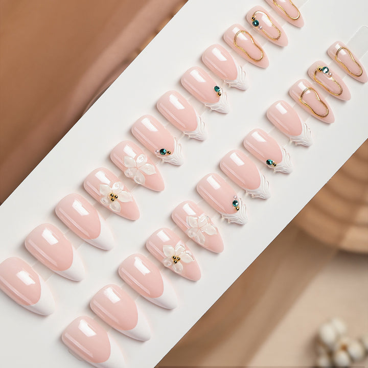 Acrylic nail set with elegant flower and rhinestone decorations Kalsten