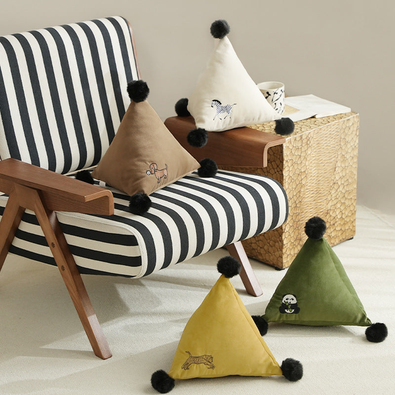 Triangular decorative pillow with zebra embroidery, pompom applications, and soft velvet cover Kalsten