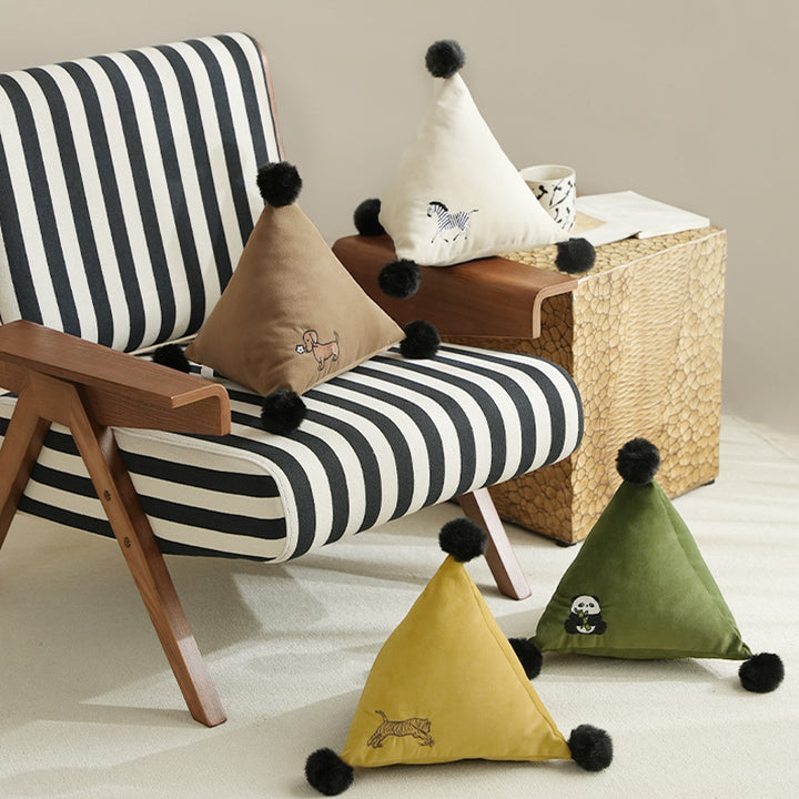 Triangular decorative pillow with zebra embroidery, pompom applications, and soft velvet cover Kalsten