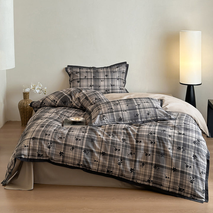 Duvet cover set with fine check pattern and subtle floral relief made of cotton blend