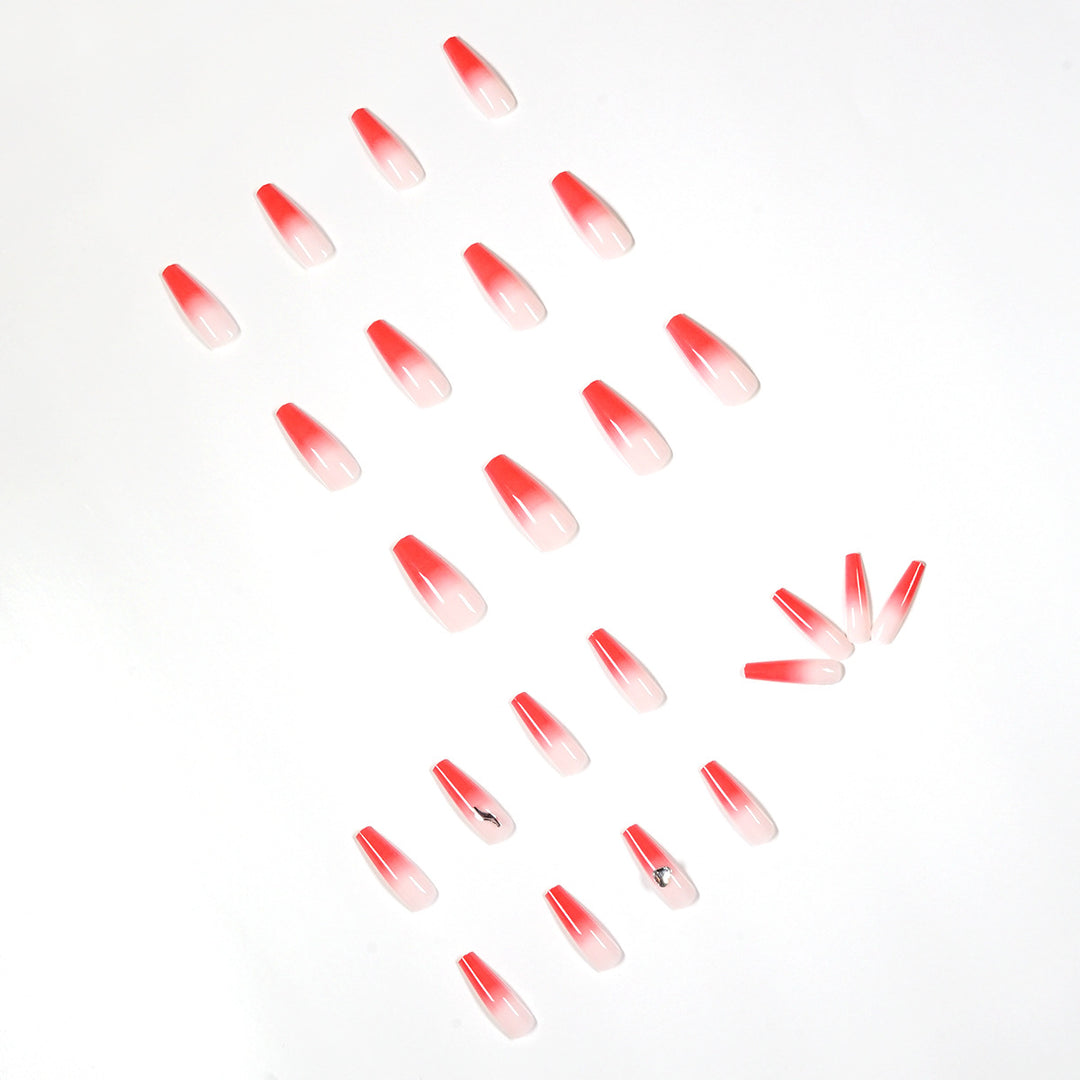 Artful stiletto nails with elegant gradient and rhinestone embellishment Kalsten