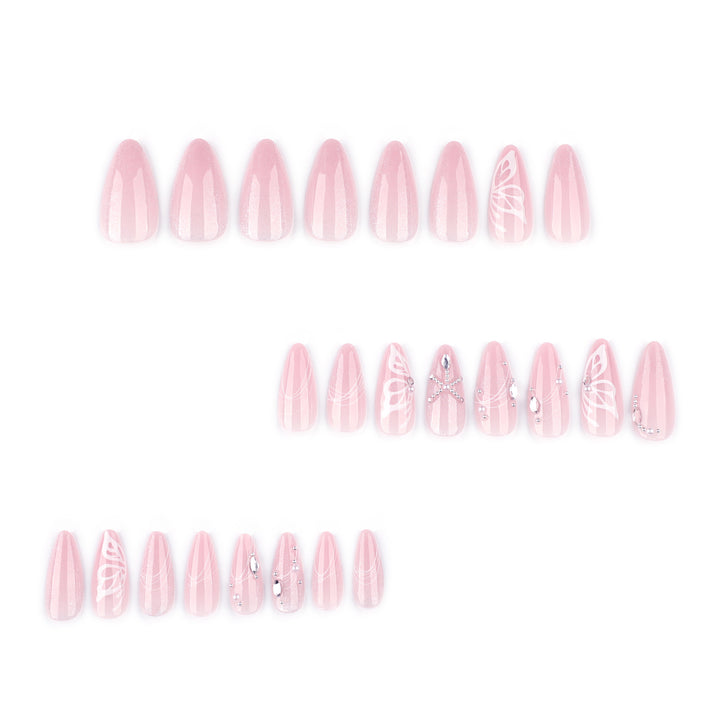 Artful nail extensions with delicate flower and glitter accents Kalsten
