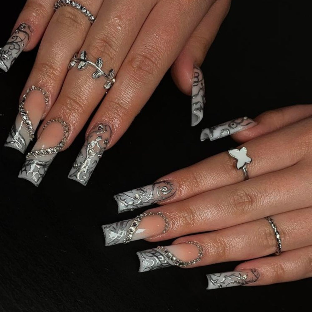 Artificial nails with elegant 3D pattern and radiant rhinestone decorations Kalsten