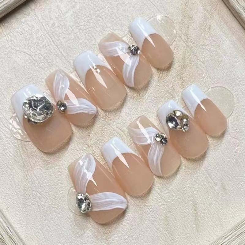 Elegant artificial nail set with delicate decorations and glitter elements Kalsten
