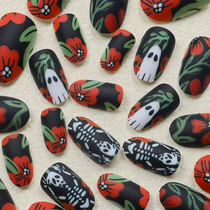 Acrylic nail set with creepy Halloween designs and floral accents Kalsten