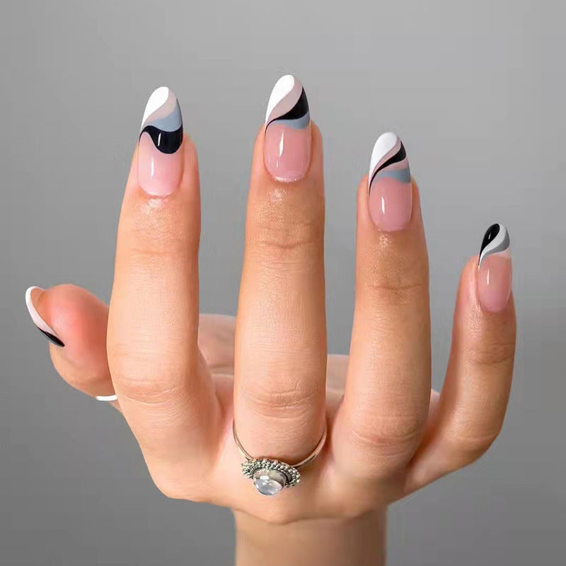 Artful nail extensions with creative wave pattern Kalsten