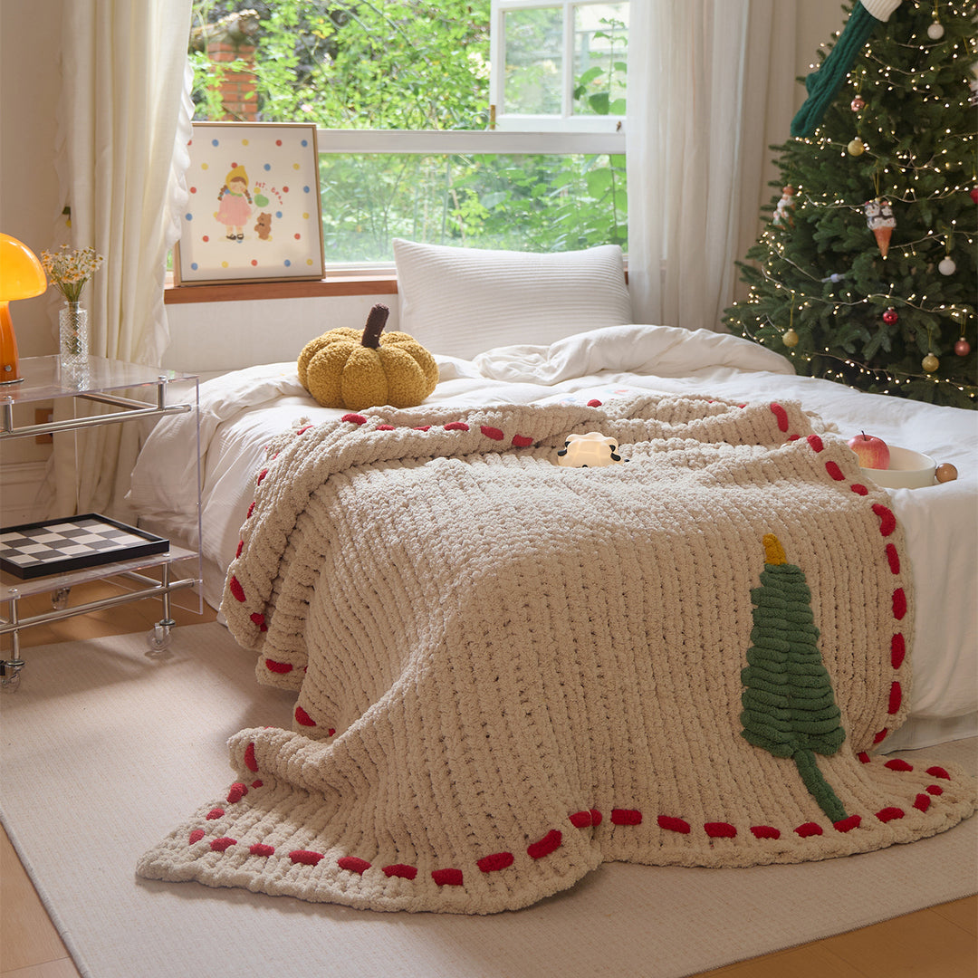 Cozy daybed cover with relief teddy structure, fir motif, and contrasting decorative seam