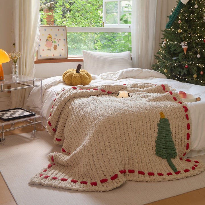 Cozy daybed cover with relief teddy structure, fir motif, and contrasting decorative seam