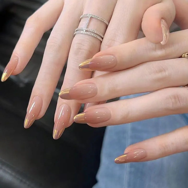 Nail art with elegant gradient and metallic accents Kalsten