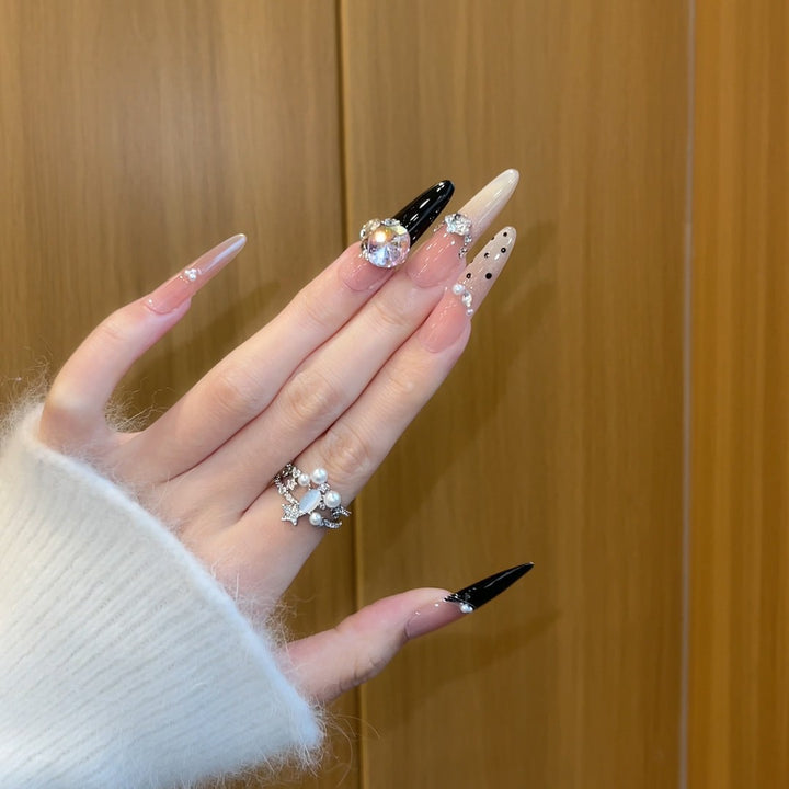 Elegant artificial nails with rhinestone and glitter elements Kalsten