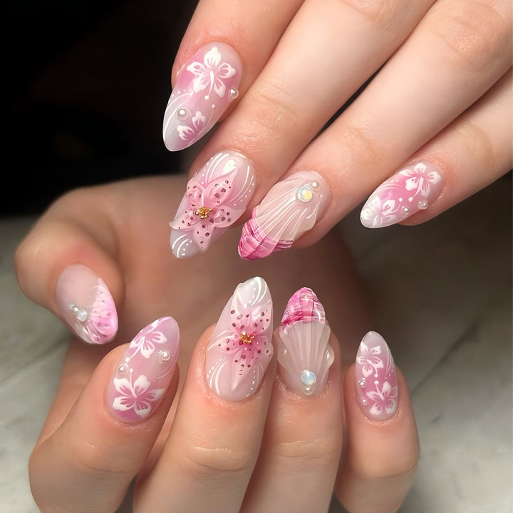 Artful Nail Extensions with Floral and Glittering Accents Kalsten