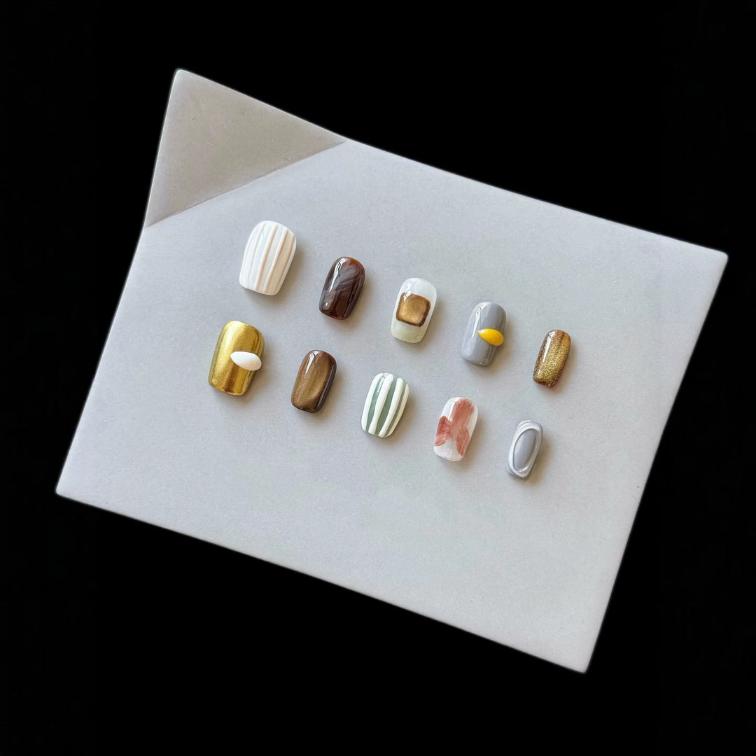 Artistic Press-On Nail Set with Unique Textured Designs