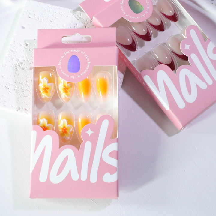 Artful nail extensions with delicate ombre effect and floral accents Kalsten