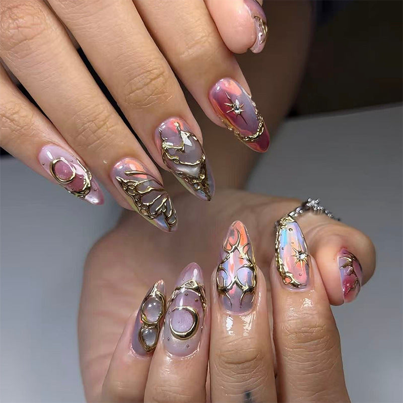 Elegant and creative artificial nails with metallic accents Kalsten
