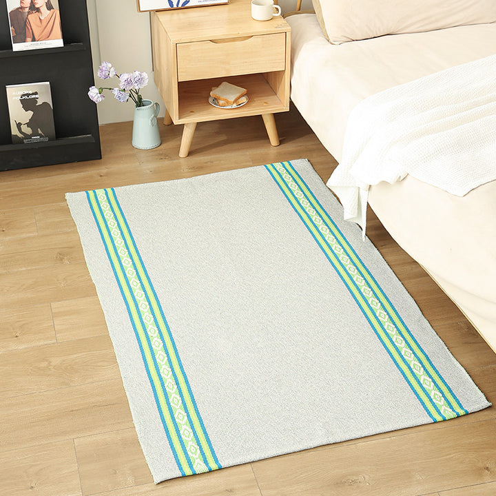 Modern flat-weave area rug with contrasting stripes and non-slip underside Kalsten