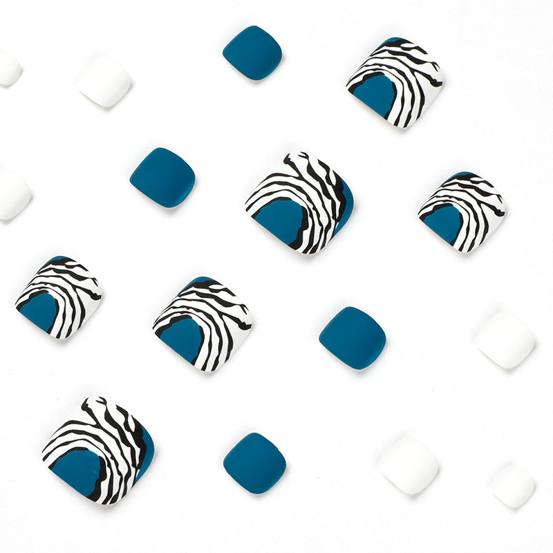 Artful toenail design in modern zebra pattern Kalsten