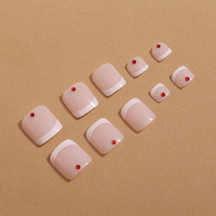 Nail art with creative geometric designs and glitter accents Kalsten