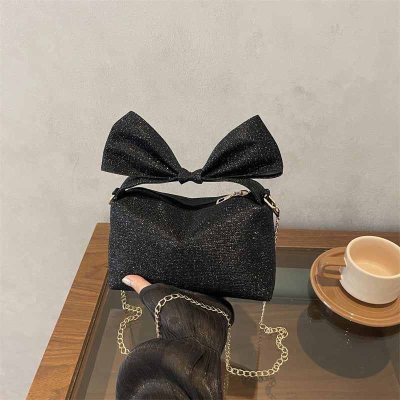 Bow-Accented Sparkling Handbag