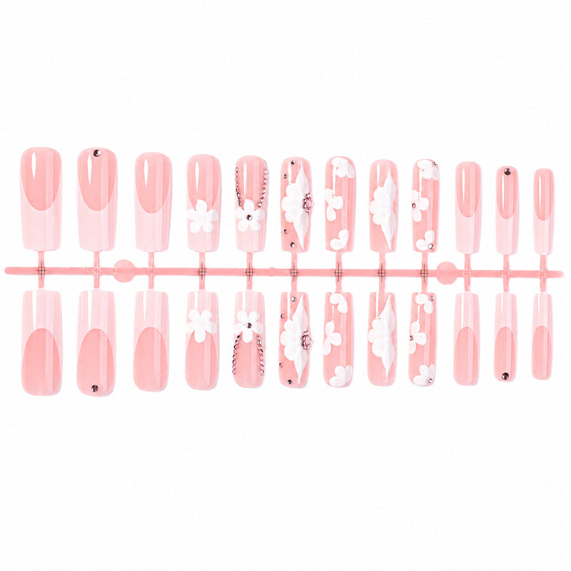 Artificial nail set with delicate flower and glitter details Kalsten