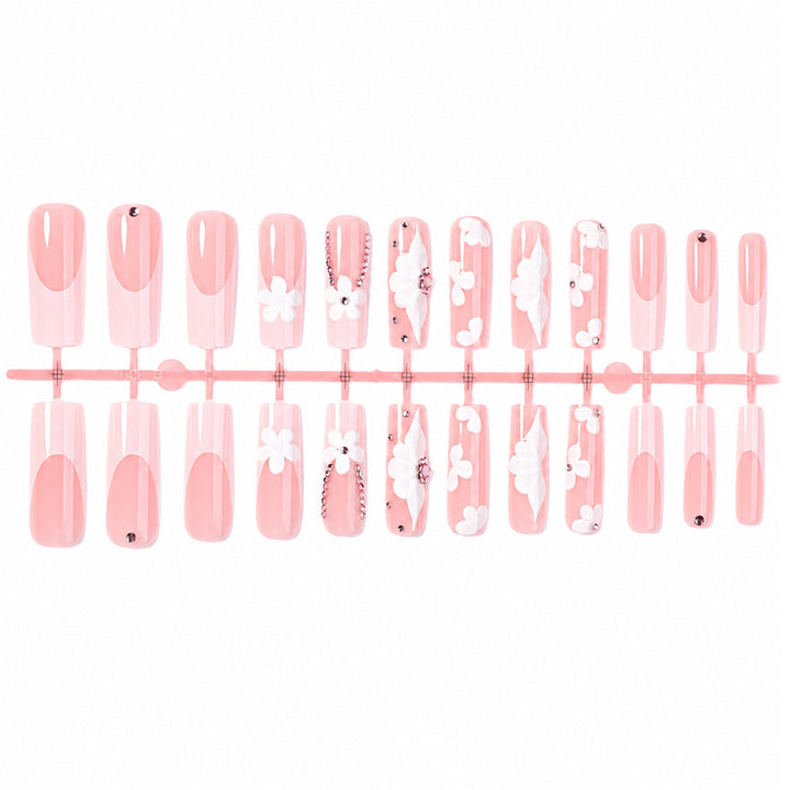 Artificial nail set with delicate flower and glitter details Kalsten